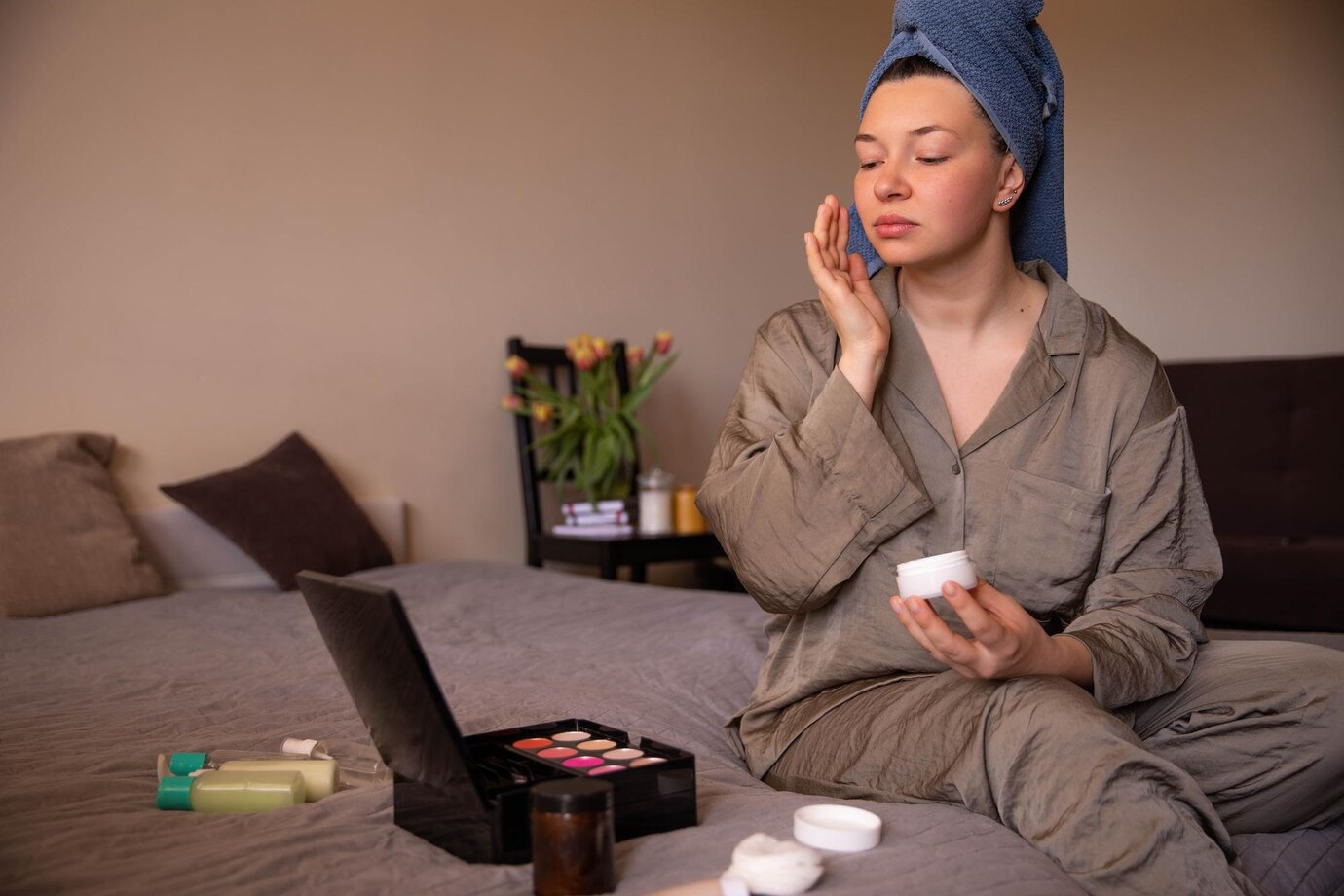 A woman looking in the mirror that how growth factors repair her skin texture