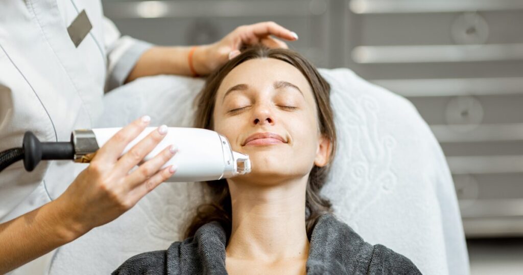 A Woman Getting MOXI Skin Treatment at the Spa