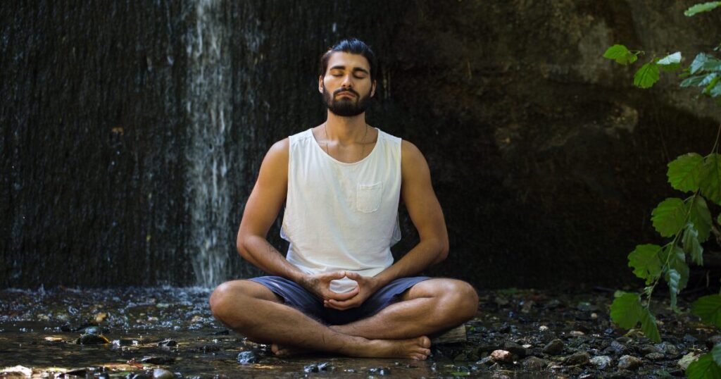 A Man Meditating to Release Stress